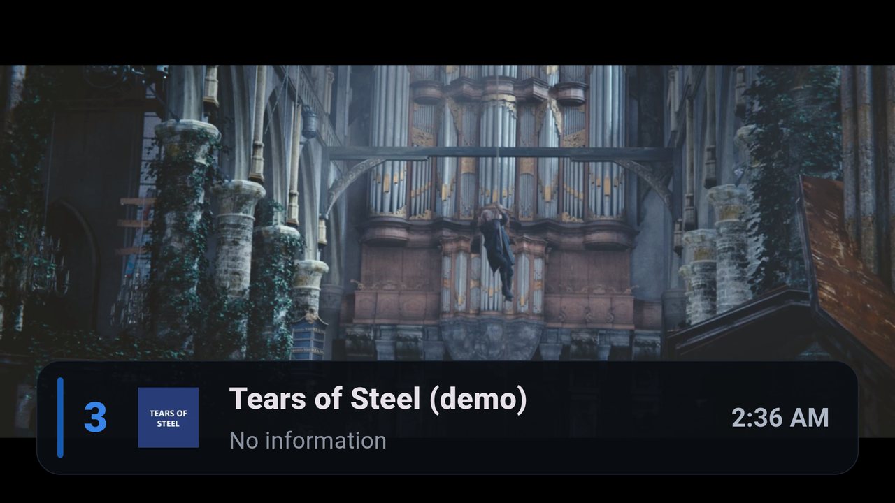 Full screen with the channel bar: number 3, name and time